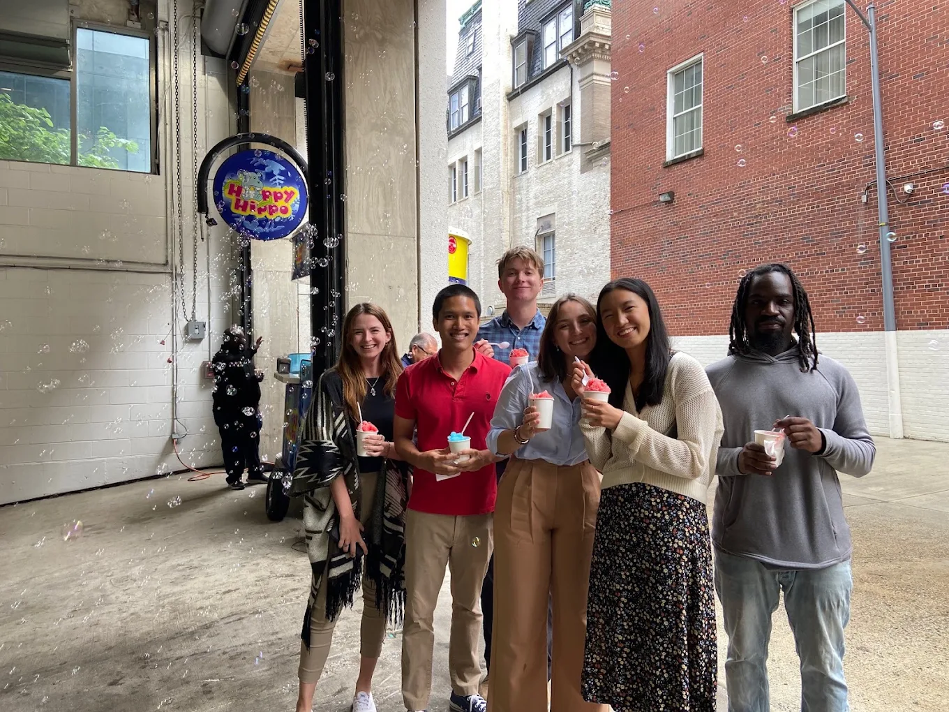 Adults enjoying Happy Hippo shaved ice